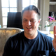 Spencer at home during his interview for this story. The plant now has white flowers.